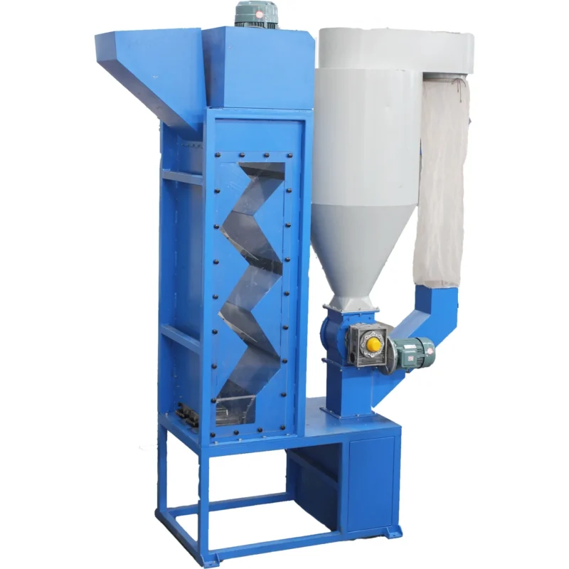 The image shows a machine known as a Zig-Zag Air Classifier. This type of equipment is commonly used in material separation and recycling processes. It functions by sorting materials based on differences in their terminal velocity in air. The zig-zag configuration allows for multiple changes in direction, increasing the likelihood that lighter materials will be separated from heavier ones as they travel through the classifier. The lower section typically collects heavier particles, while lighter materials are carried upwards by the air flow to be collected separately.