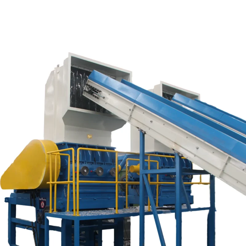 The machine in the image is a wet plastic grinding or washing machine, used in recycling processes. These machines are designed to clean, grind, and prepare plastic waste for recycling by removing contaminants and reducing the material to smaller flakes or particles that can be more easily processed in subsequent steps of the recycling chain. The use of water not only helps to clean the material but also acts as a medium to cool the process, which can prevent melting or degradation of the plastic due to frictional heat generated during grinding